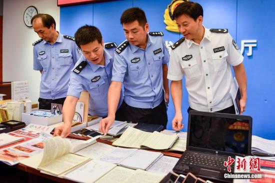 廣東警方“利劍行動”摧毀多個新型非法集資網絡傳銷犯罪團伙。 /p中新社記者 陳驥旻 攝